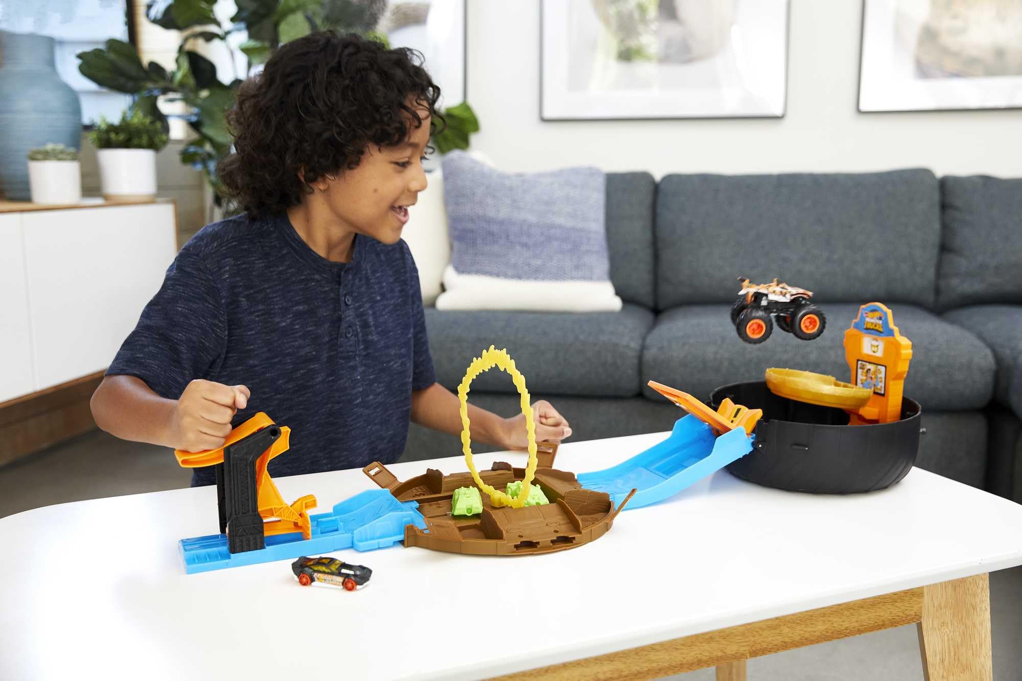 Hot Wheels Monster Trucks Stunt Tire Playset - Includes 3 Monster Trucks & 3 Scale Vehicles | 1:64 Scale